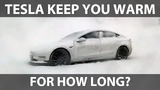Tesla Model 3 camping in snow storm