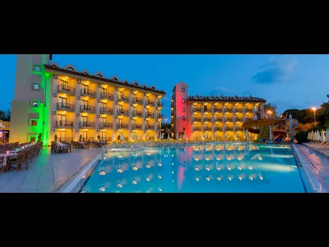 Luftaufnahme des Victory Resort Hotels mit mehreren Gebäuden, Pools und Gärten.