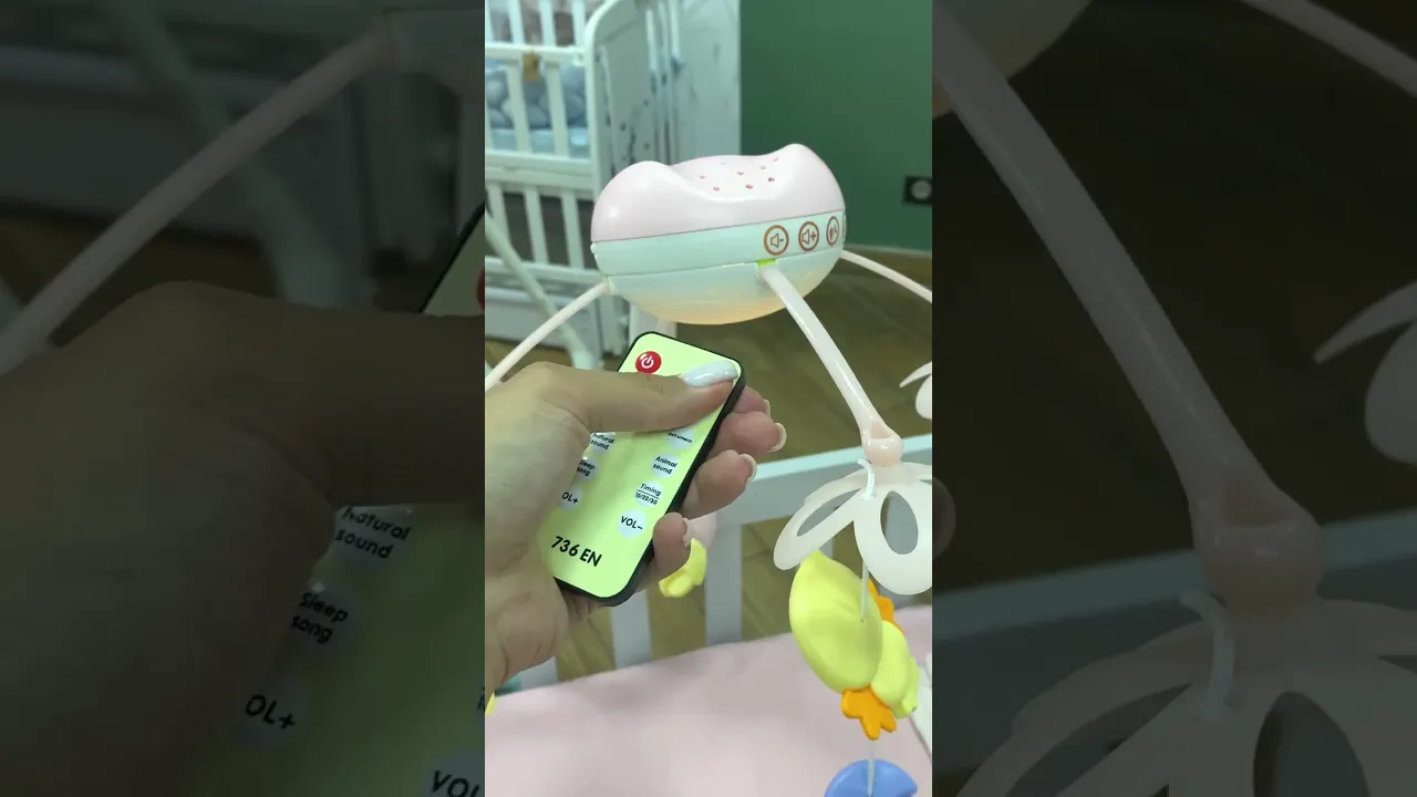 Карусель на кроватку с проектором и пультом ДУ