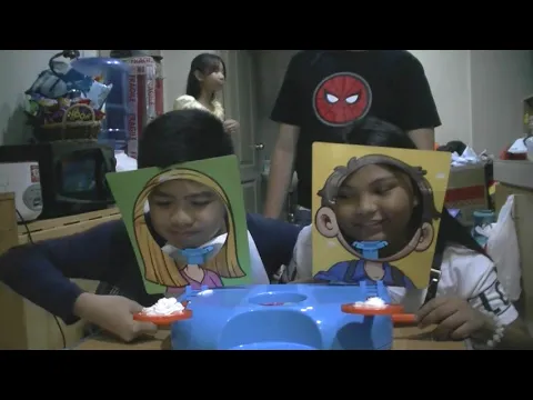 Children play Wacky Face (Pie Face) game