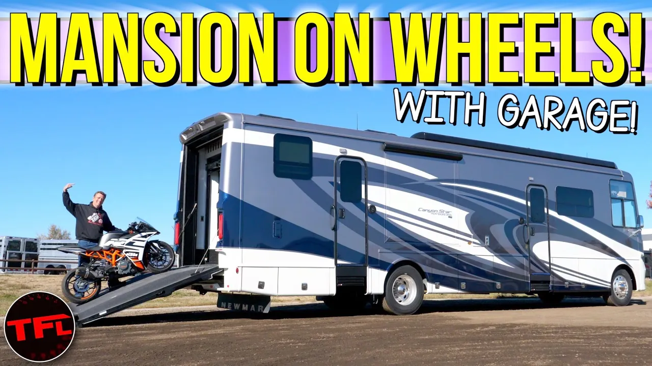 This Diesel Motorhome Lets You Bring Your Big Toys With You Inside Its Garage!