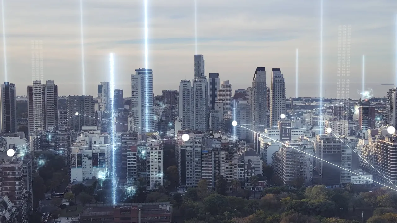 Image of city skyline with simulated wireless connections intersecting the buildings showing a virtual connection.