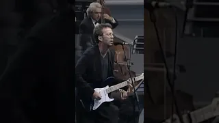 Eric Clapton and Luciano Pavarotti perform 