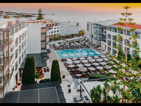 Luftaufnahme des Albatros Spa & Resort mit vielen Gebäuden und einer langen Strandlinie