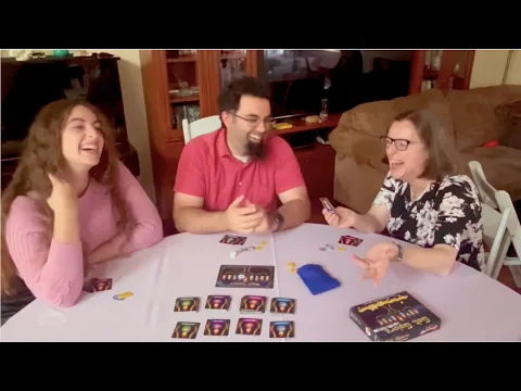 Laughter abounds as a trio playtests Gelt Galore: Pocket Edition