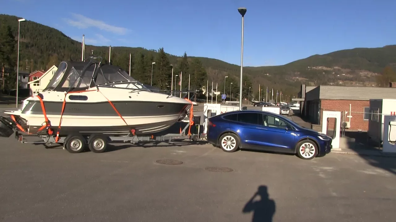 Model X towing a big boat