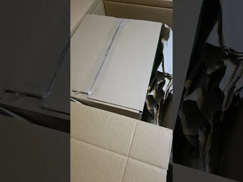 Opening a carton of Here Comes a Candle