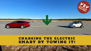 EV to EV charging! Model X Towing Smart Car to Transfer Energy