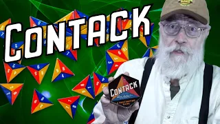 The antique game of "Contack" is Triangular Dominoes... sort of.