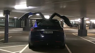 Opening falcon wing doors in garage