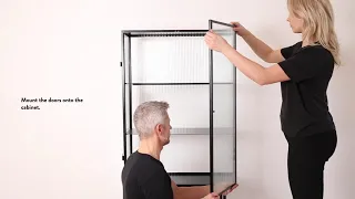ferm LIVING Haze Vitrine, Reeded Glass, Black product video.