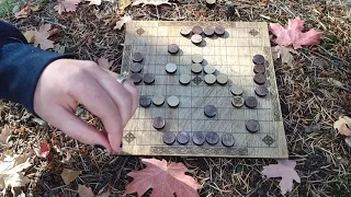 Random (ish) play. We play Hnefatafl