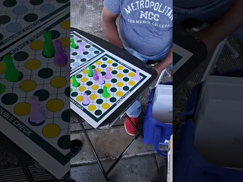 Teaching a Young Player Double Check in Omaha’s Old Market