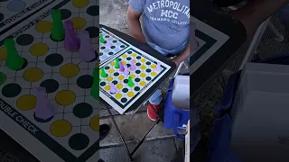 Teaching a Young Player Double Check in Omaha’s Old Market