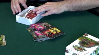 unboxing video of welcome back to the dungeon