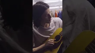 Backstage with another guitar and another couple minutes to play