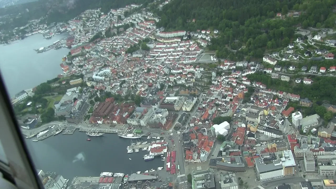 Flight over Bergen with small fossil airplane