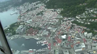 Flight over Bergen with small fossil airplane