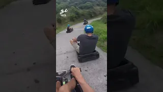 Downhill luge racing looks like Mario Kart has been brought to life! 🏎