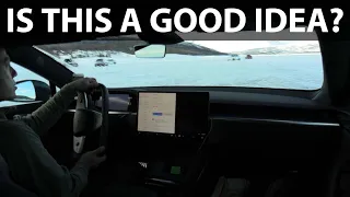 Tesla Model S Plaid with yoke wheel on ice track & making donuts