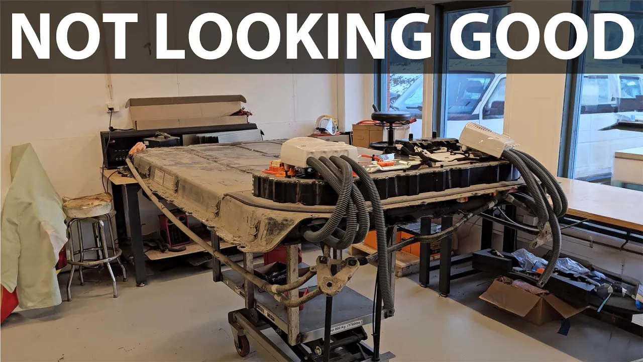 Elbilmek repairing Tesla Model 3 with flooded battery