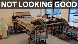 Elbilmek repairing Tesla Model 3 with flooded battery