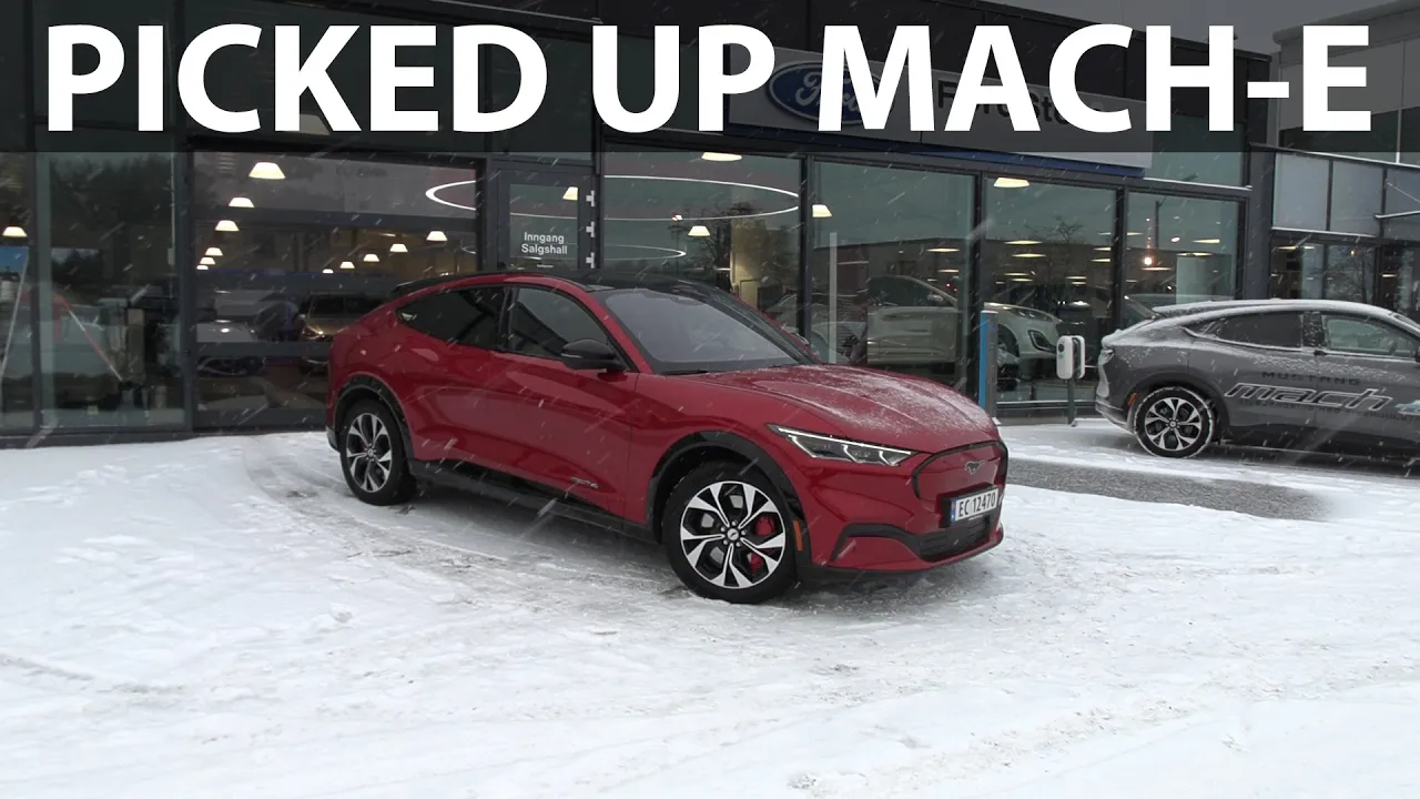 Driving Think City to pick up Ford Mustang Mach-E Long Range AWD
