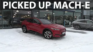 Driving Think City to pick up Ford Mustang Mach-E Long Range AWD