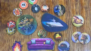 Aliens with special tokens in Cosmic Encounter.