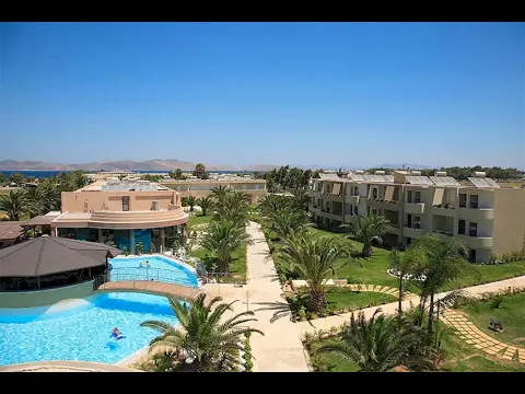 Luftaufnahme des Sandy Beach Hotel - Kos Resort mit Swimmingpool und Gebäuden